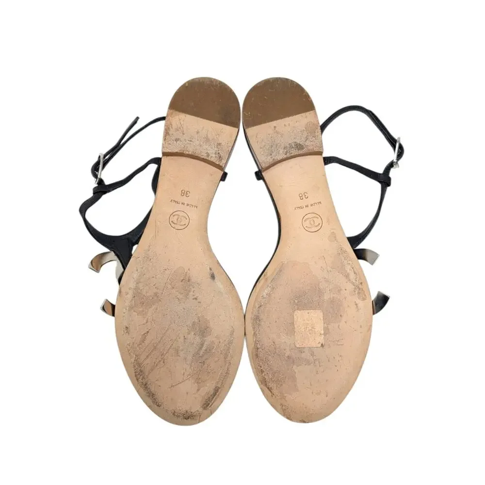 Chanel Big Logo Filigree Thong T-Strap Flat Sandal Black Leather Silver 38 | 7.5